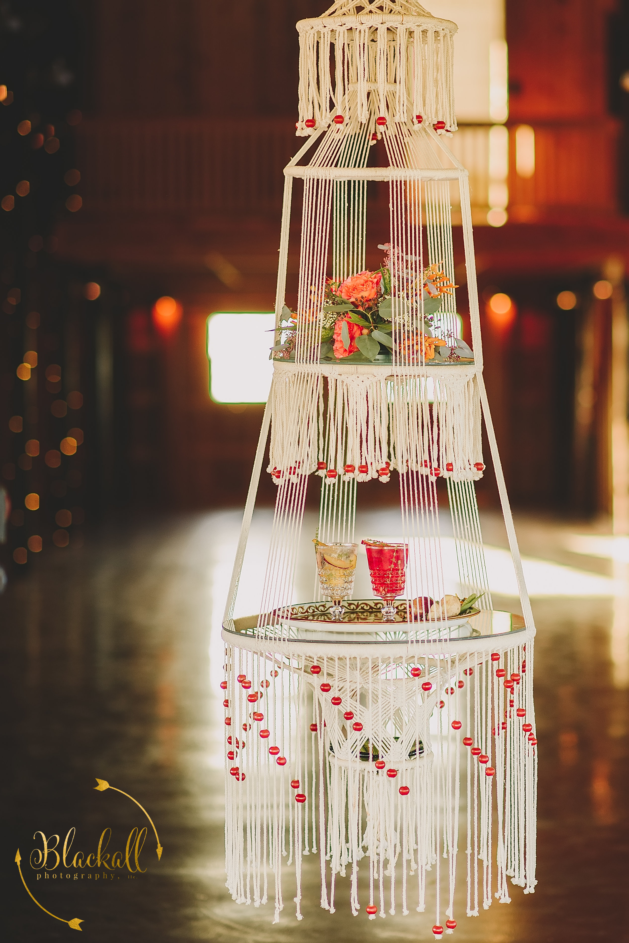  Cheers! What a original way to deliver drinks to the bride + groom! I love this Macrame Hanging Table!!   