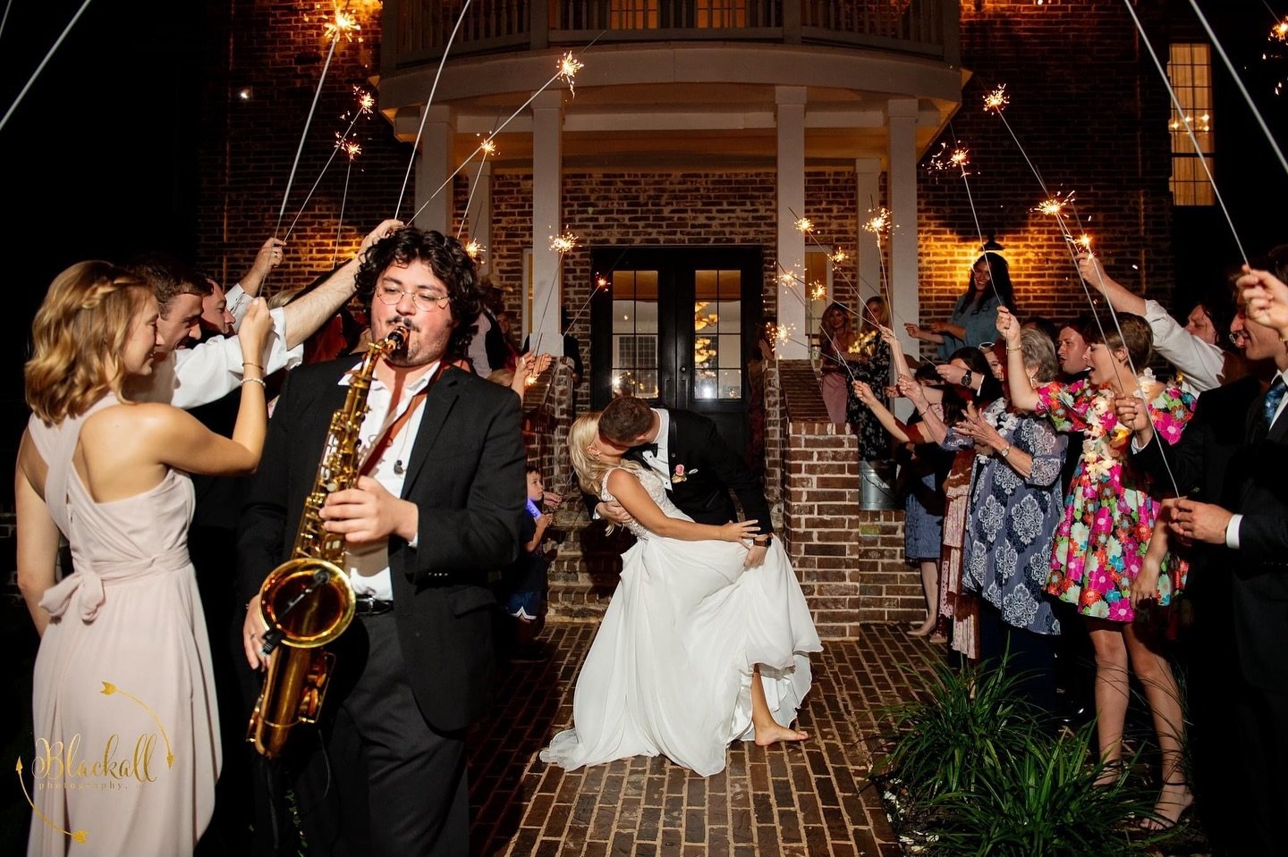 Picture yourself basking in the glow of your most memorable day, winding down with a charming exit illuminated by twinkling sparklers. As you reach your vintage getaway car, you&rsquo;re serenaded by the soulful melody of a saxophone, playing none ot