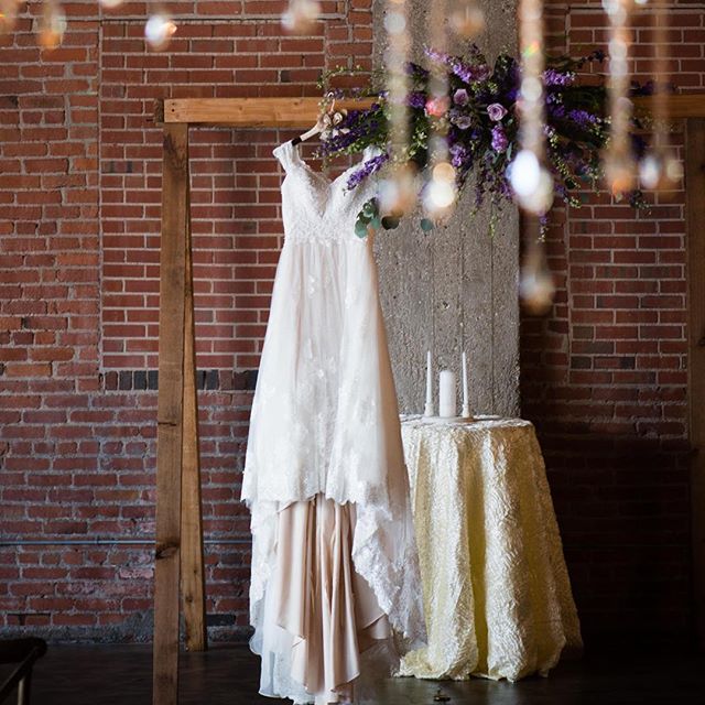 Le Sigh, Old World beauty at its best. #bride #gown #chandelier #brick #brickandmortarevents #wichitaweddingphotographer #wichita #naturallight #authenticbeauty
