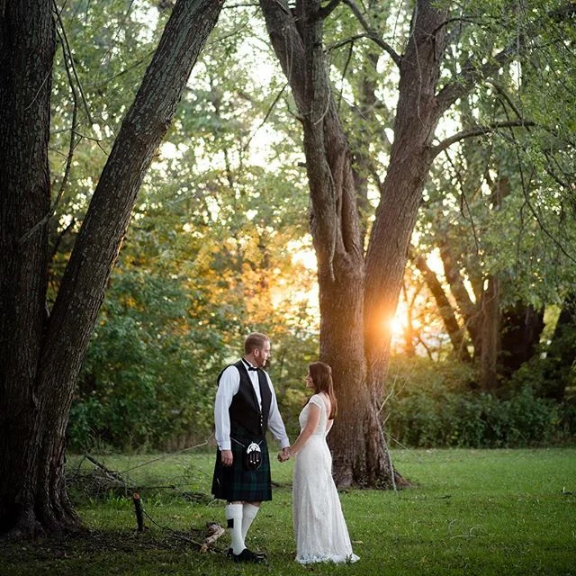 Golden hour rises to the occasion to celebrate this newly married pair. ❤️ #newlyweds #love #gold #scottish #kilt #groom #bride #weddingphotography #kansascity #wichita #reallytalltrees #