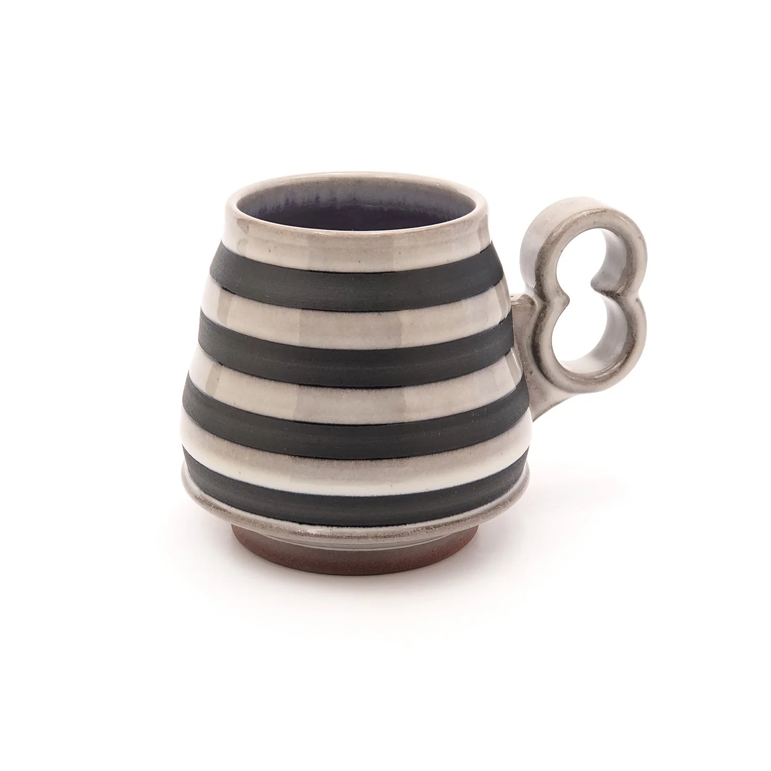 16 oz. Black and white striped mug with two finger "open 8" handle. violet interior