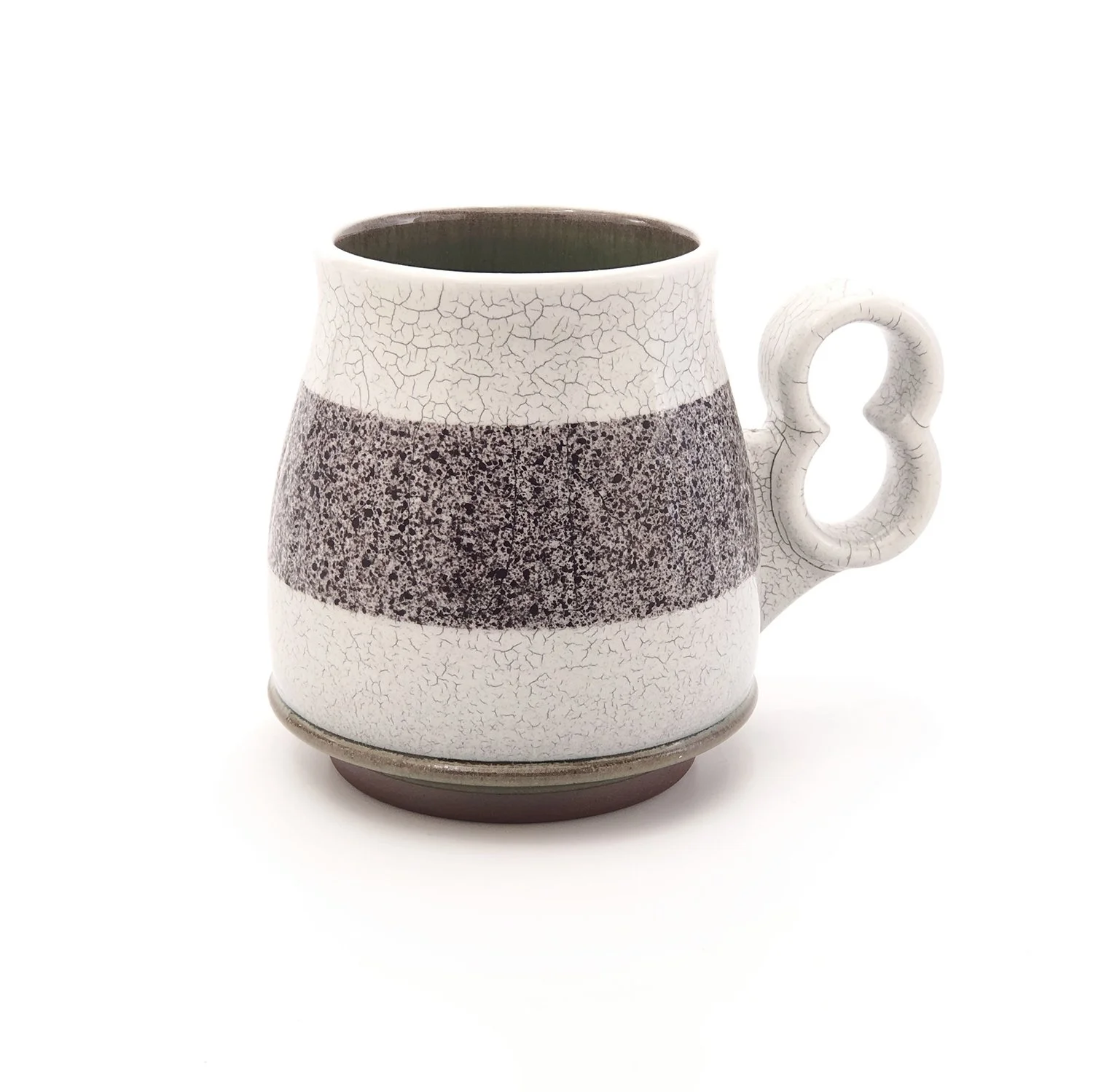 16 oz. "Unredacted" mug (HAND WASH ONLY) with crackle slip and "open 8" handle. Green interior