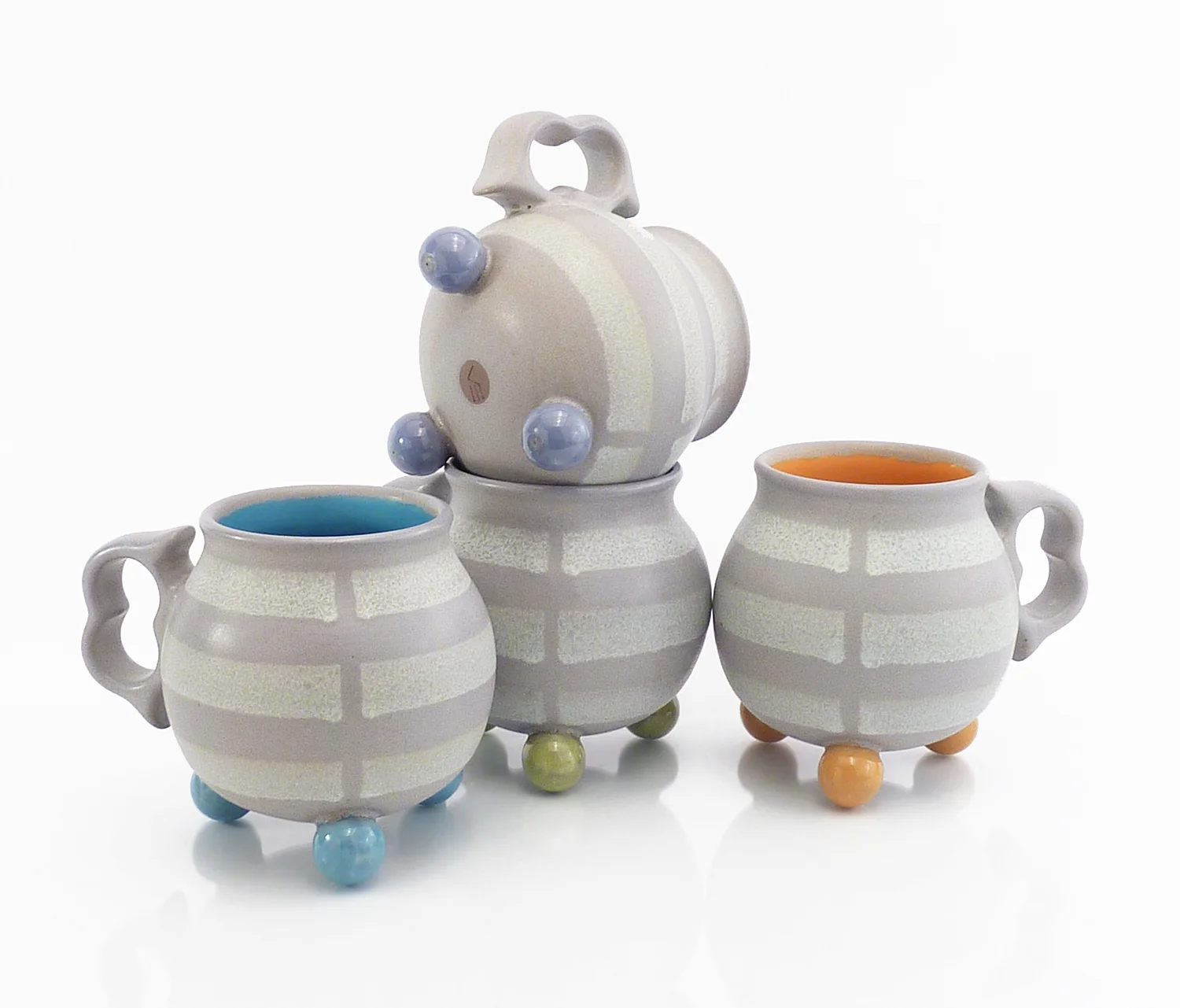Ball footed "broken stripe" mugs