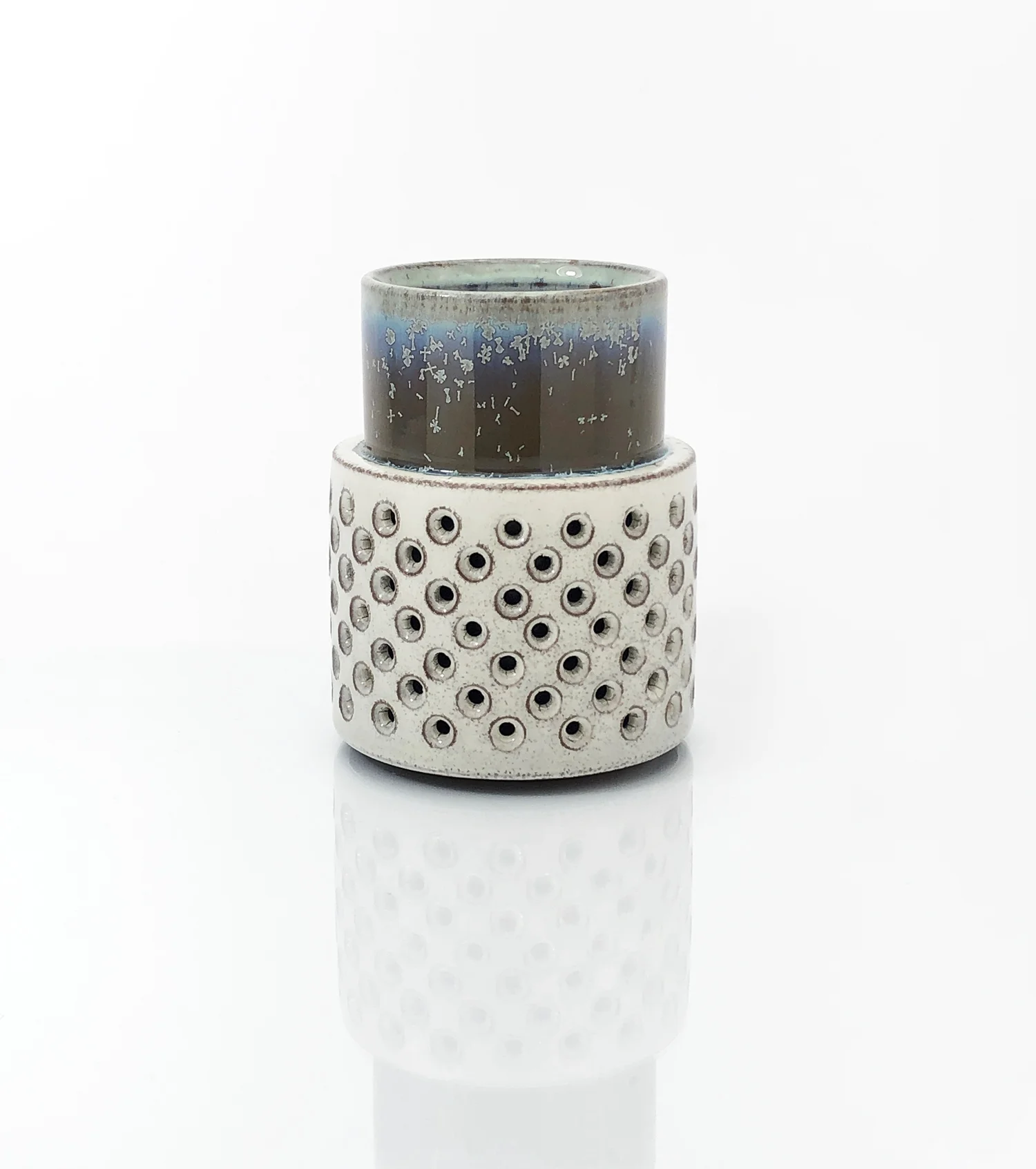 Double walled cup with perforated "handle"
