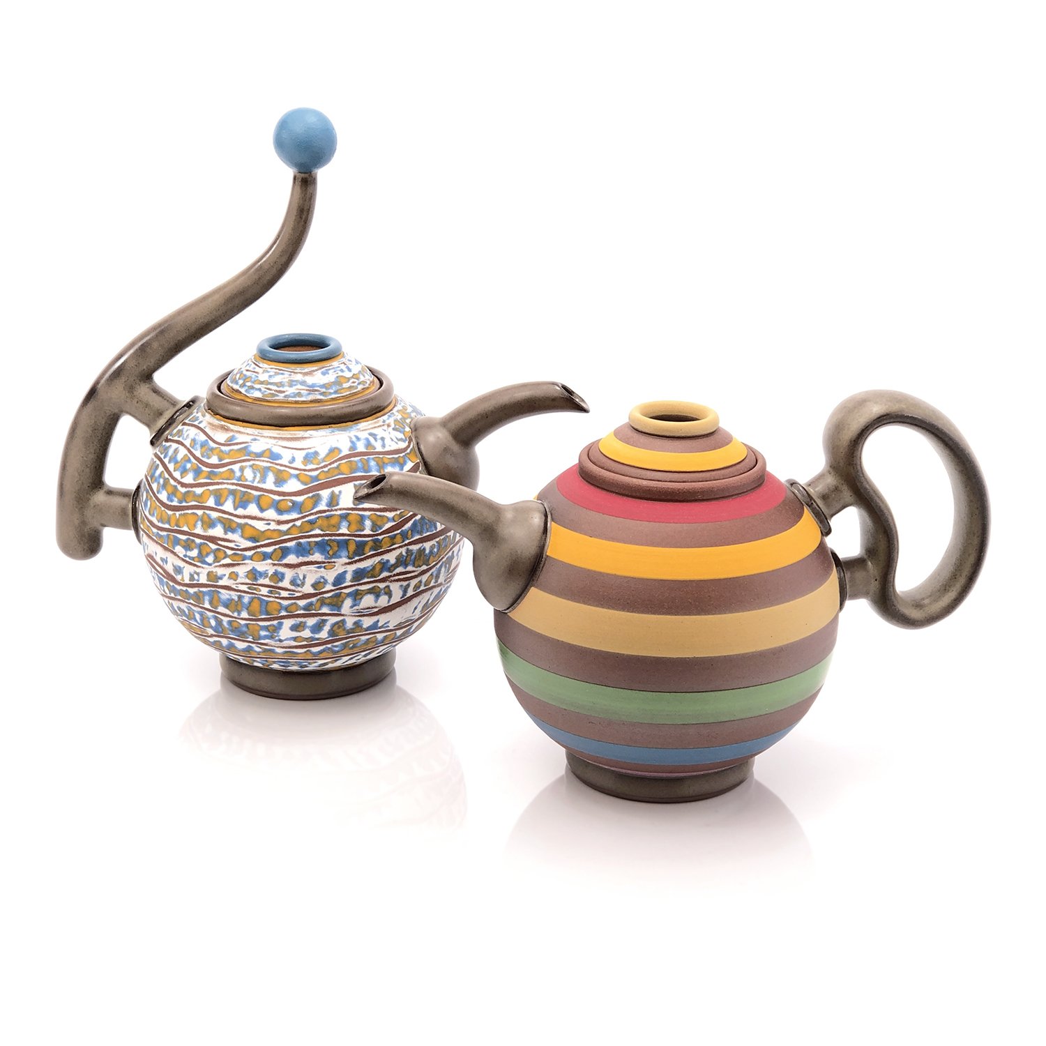 Abraded and rainbow teapots