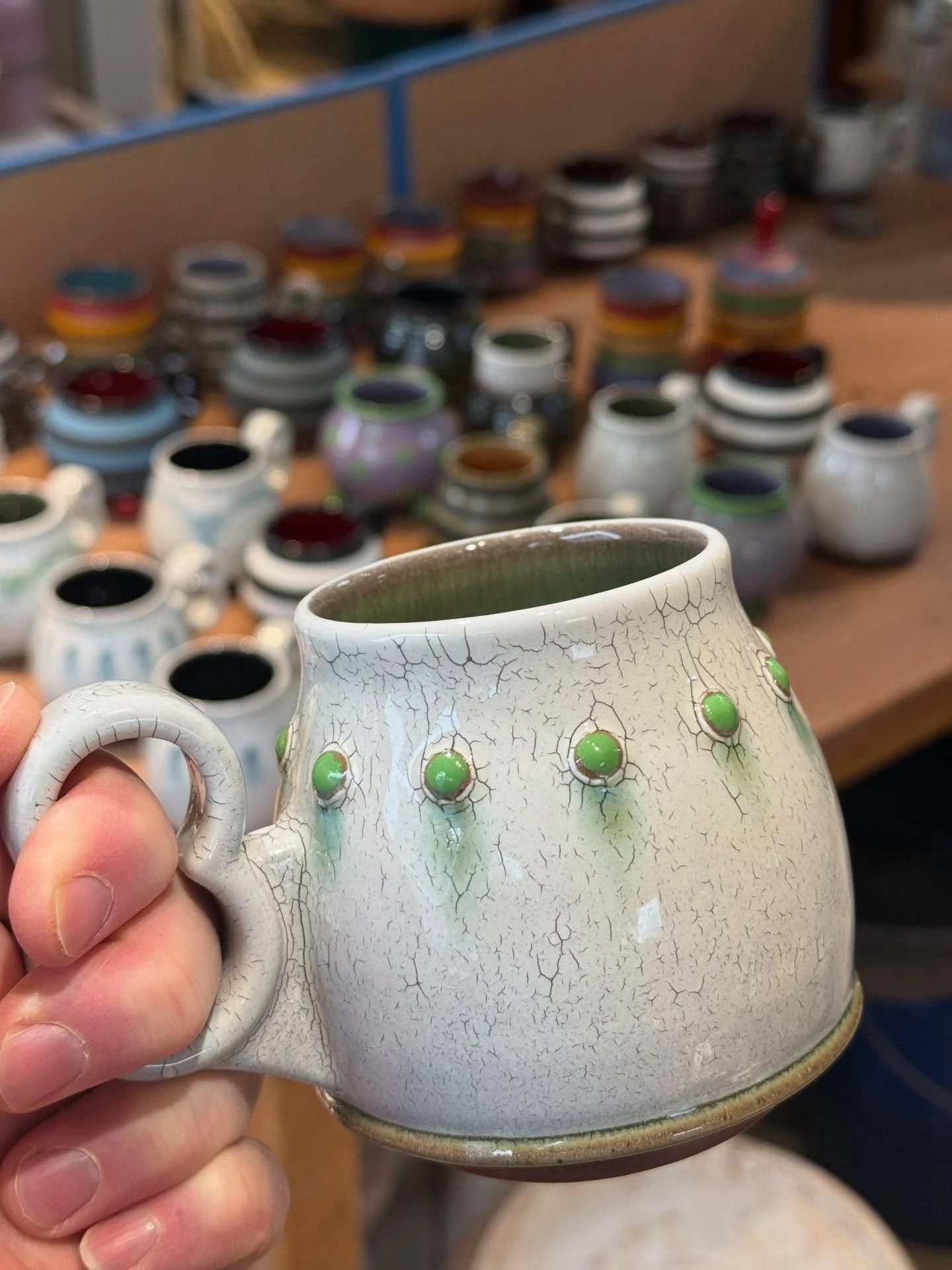 Oozing pustules mug!&hellip; Oooh, sorry, bad marketing. Pretty green pleasure bumps? 🤔Anyway, I hope to restock the shelves sometime later next week.
.
.
.
#ceramics #pottery #mug #crackleslip