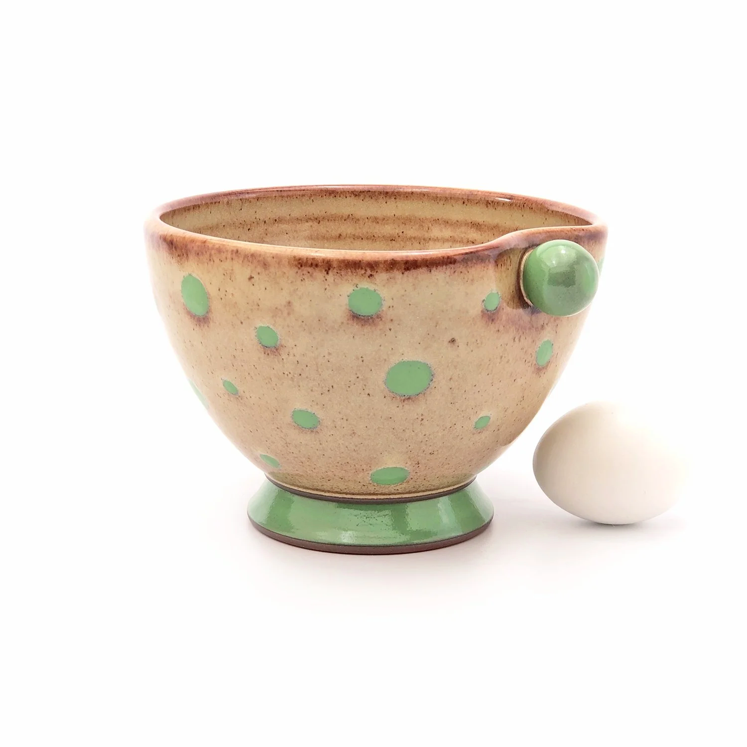 26 oz. bowl. Rusty Shino with green polkas.