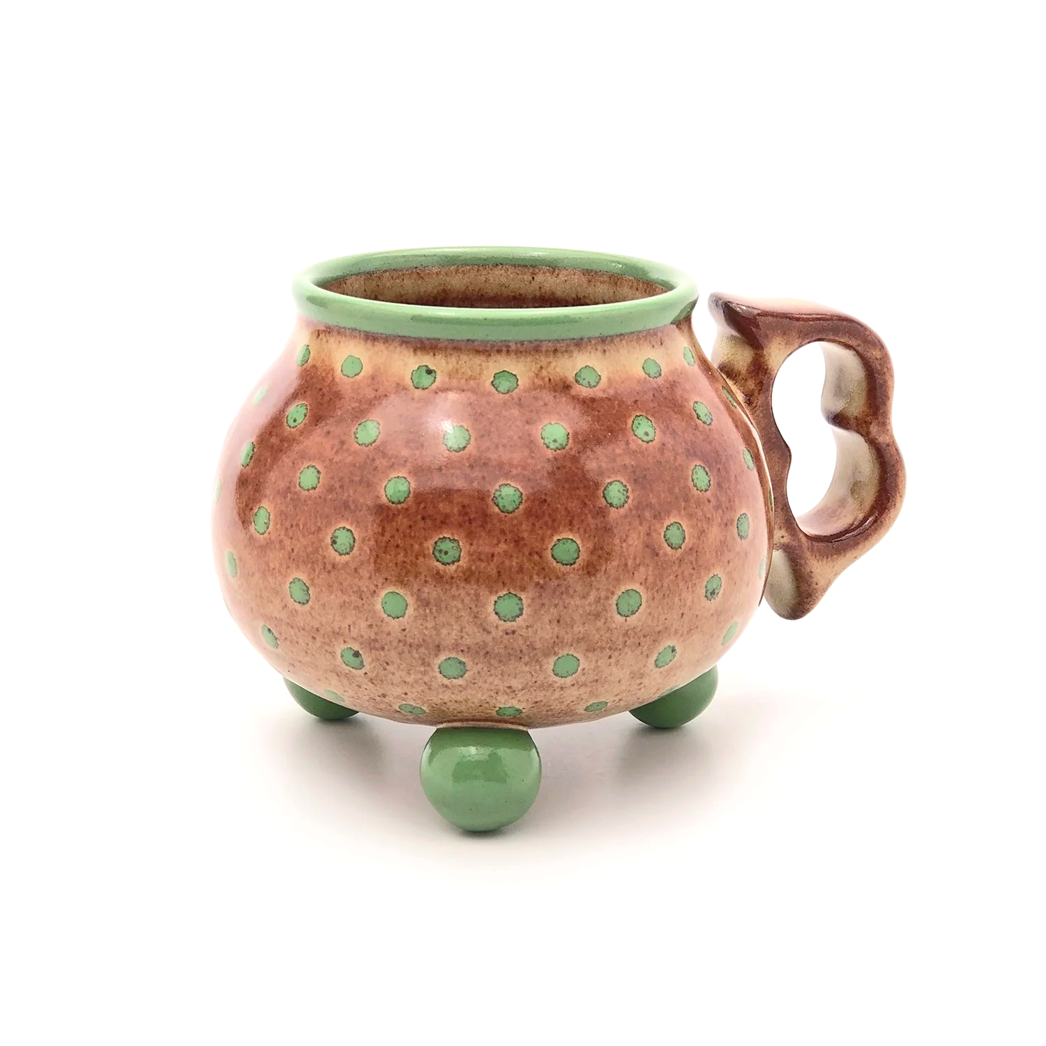 15oz. Shino polka tripod mug with ergonomic two finger handle.