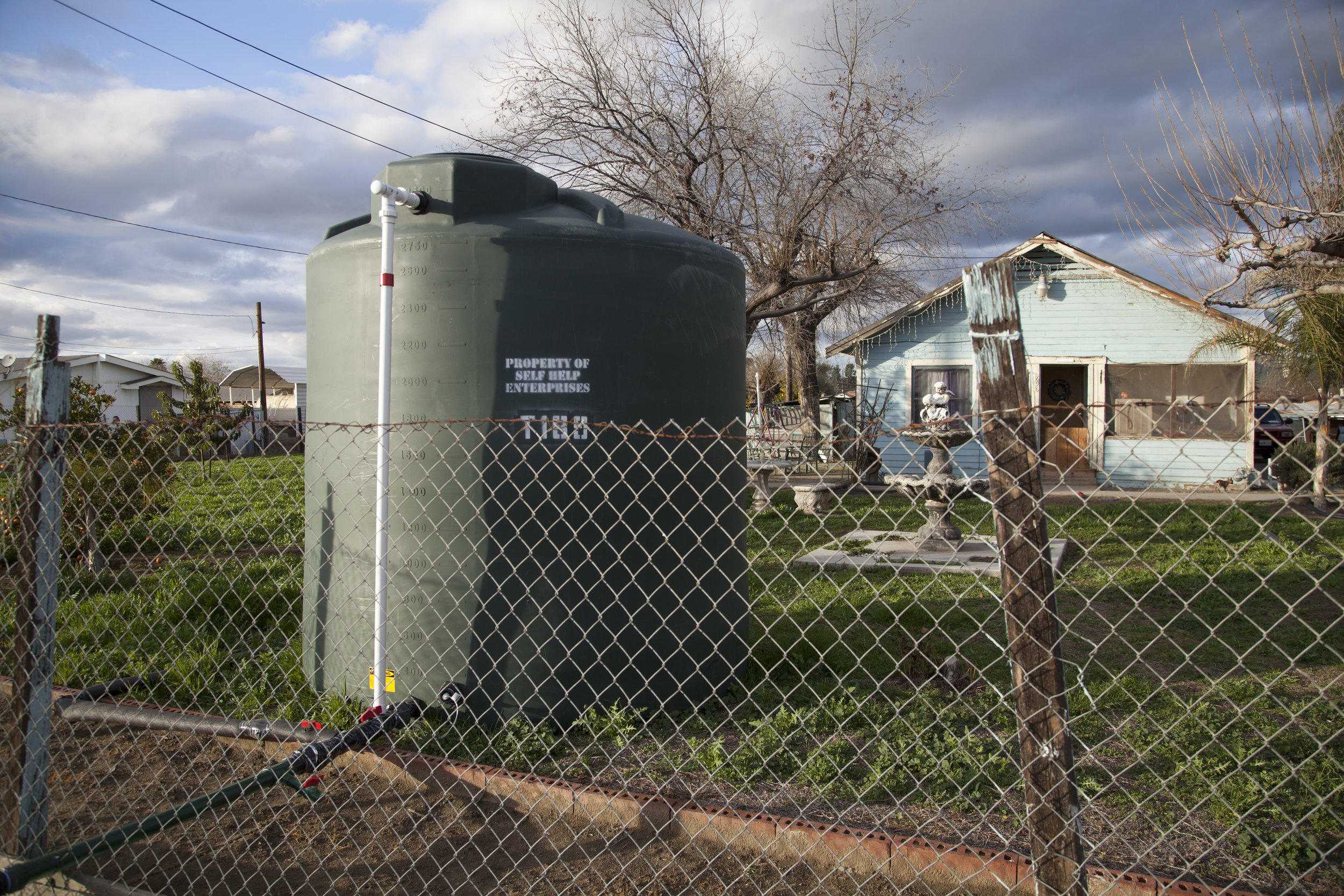  Finally 2500 gallon tanks were installed in people’s yards to provide non-potable water in their homes. 