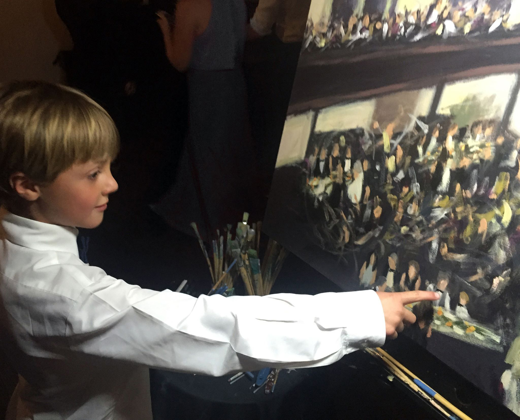 A young guest spotted himself in the painting! // Live Wedding Painting by Cleveland Event Painter Jacqueline DelBrocco