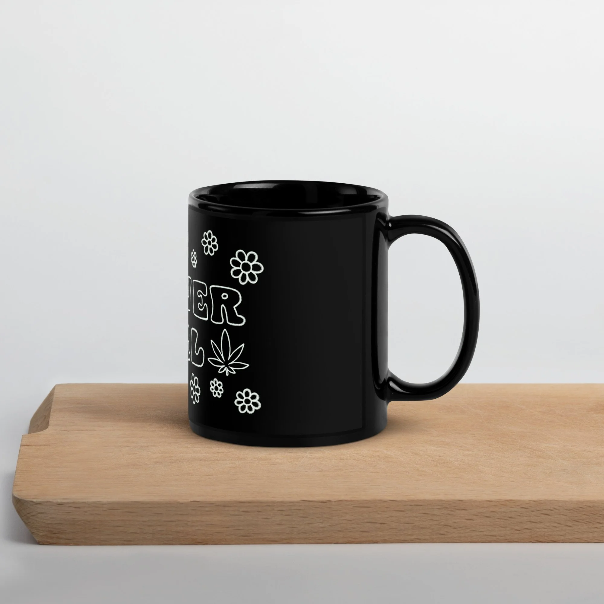 black-glossy-mug-black-11oz-handle-on-right-6510f2db77c0b.jpg