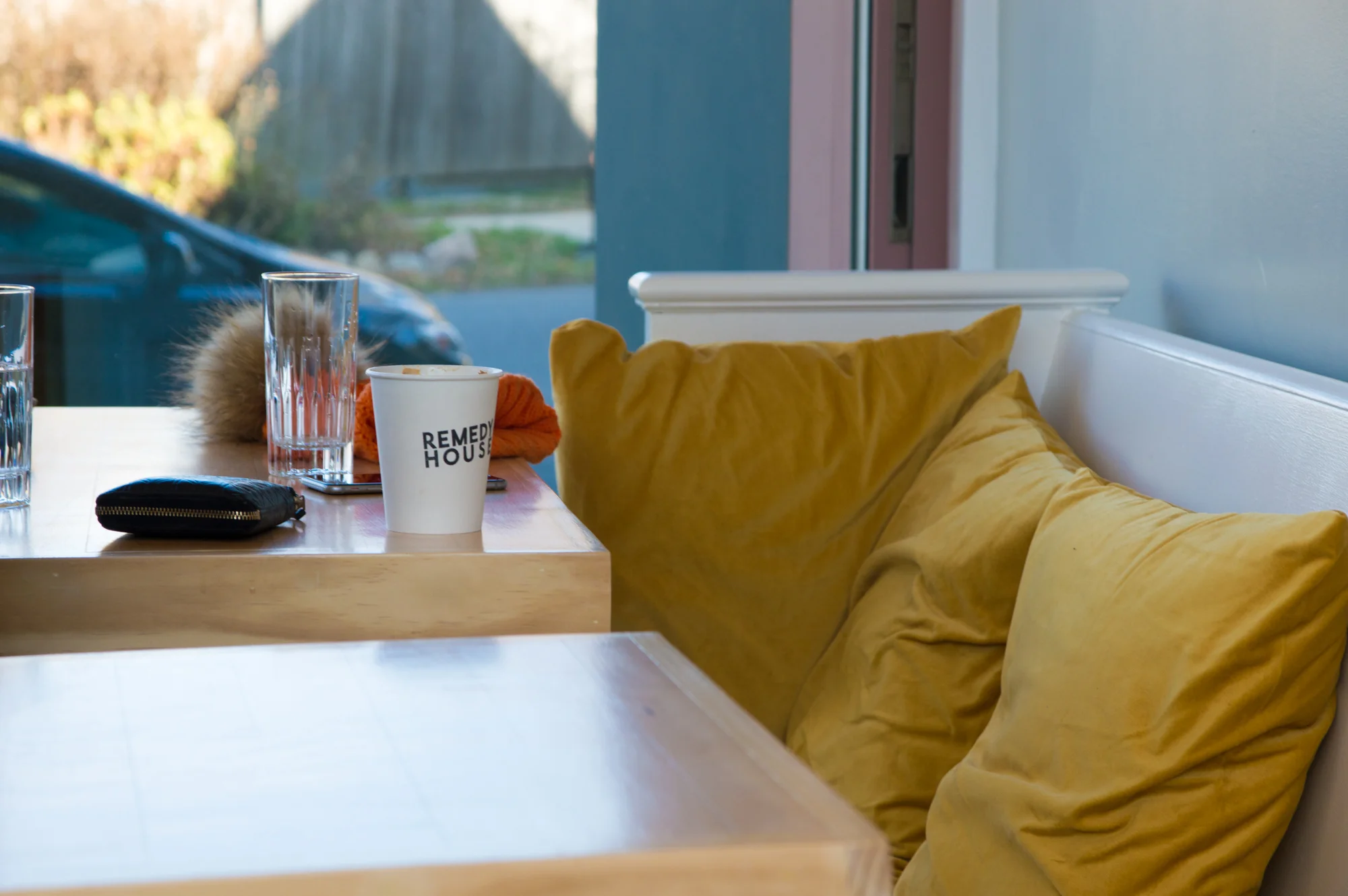 gold velvel pillows in modern cafe