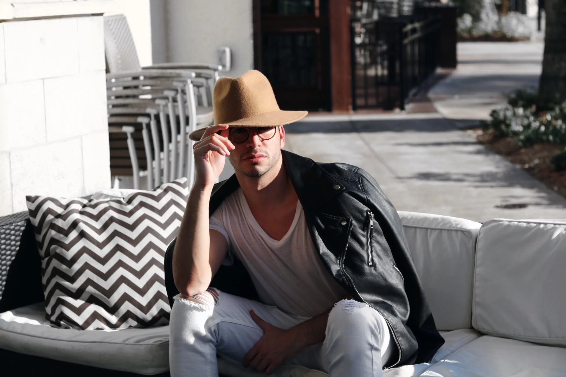 Jacket: H&M - Hat: UrbanOutfitters - Jeans: Pacsun - Glasses: Oliver Peoples Photos by Elizabeth Molina