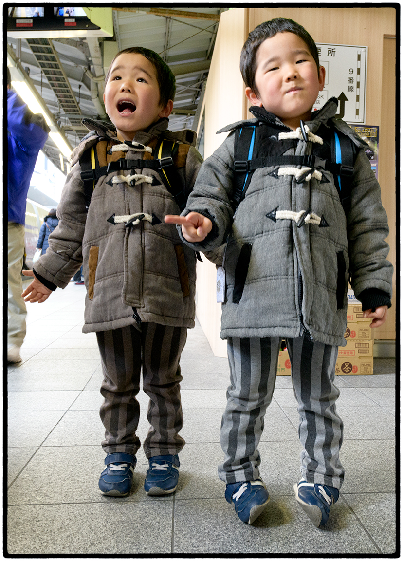 Twins stepping off a Train, Tokyo