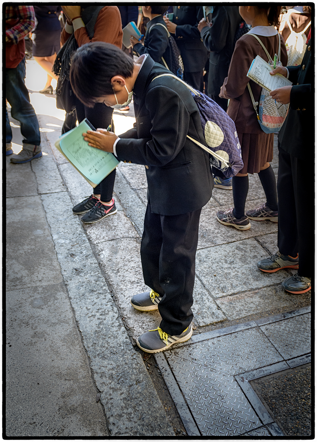 Prayers at the Golden Pavilion of Kinkaku-ji. Kyoto 1