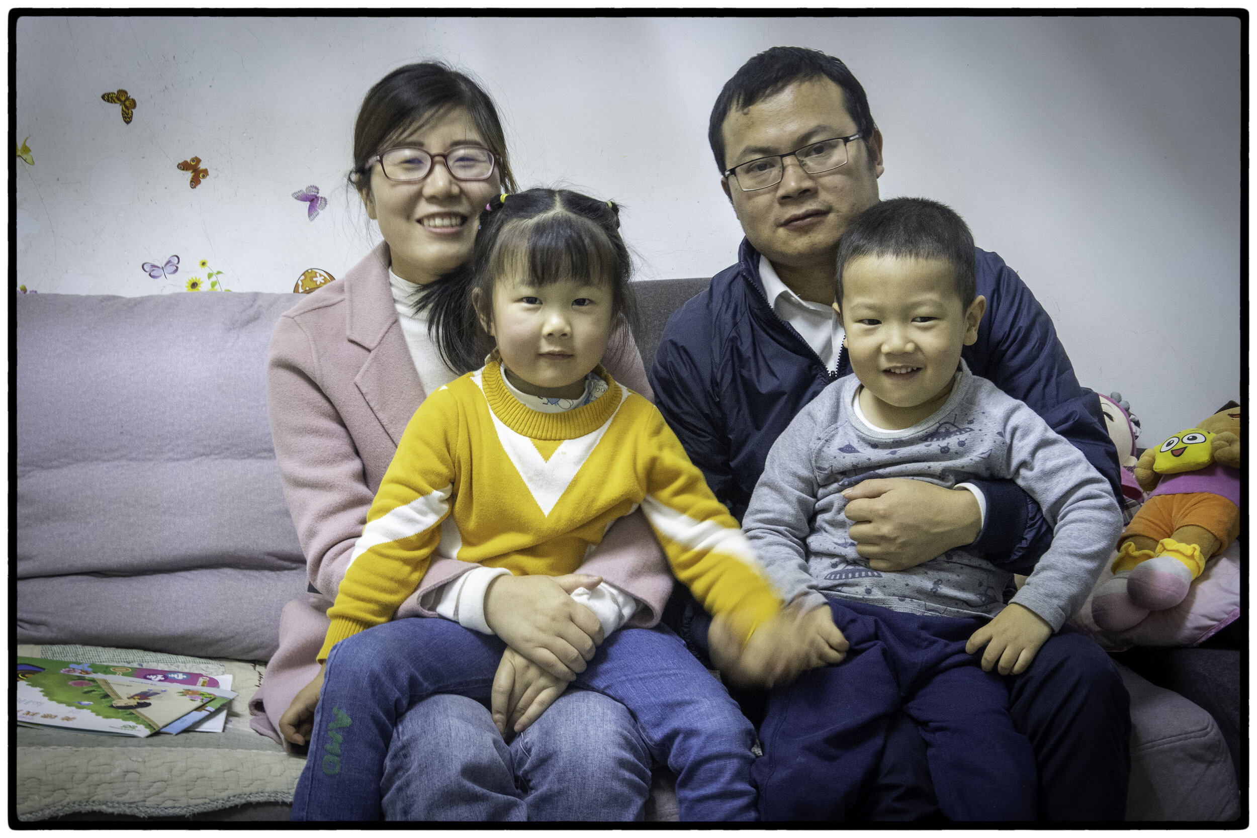 Zhong, his wife, and their twins