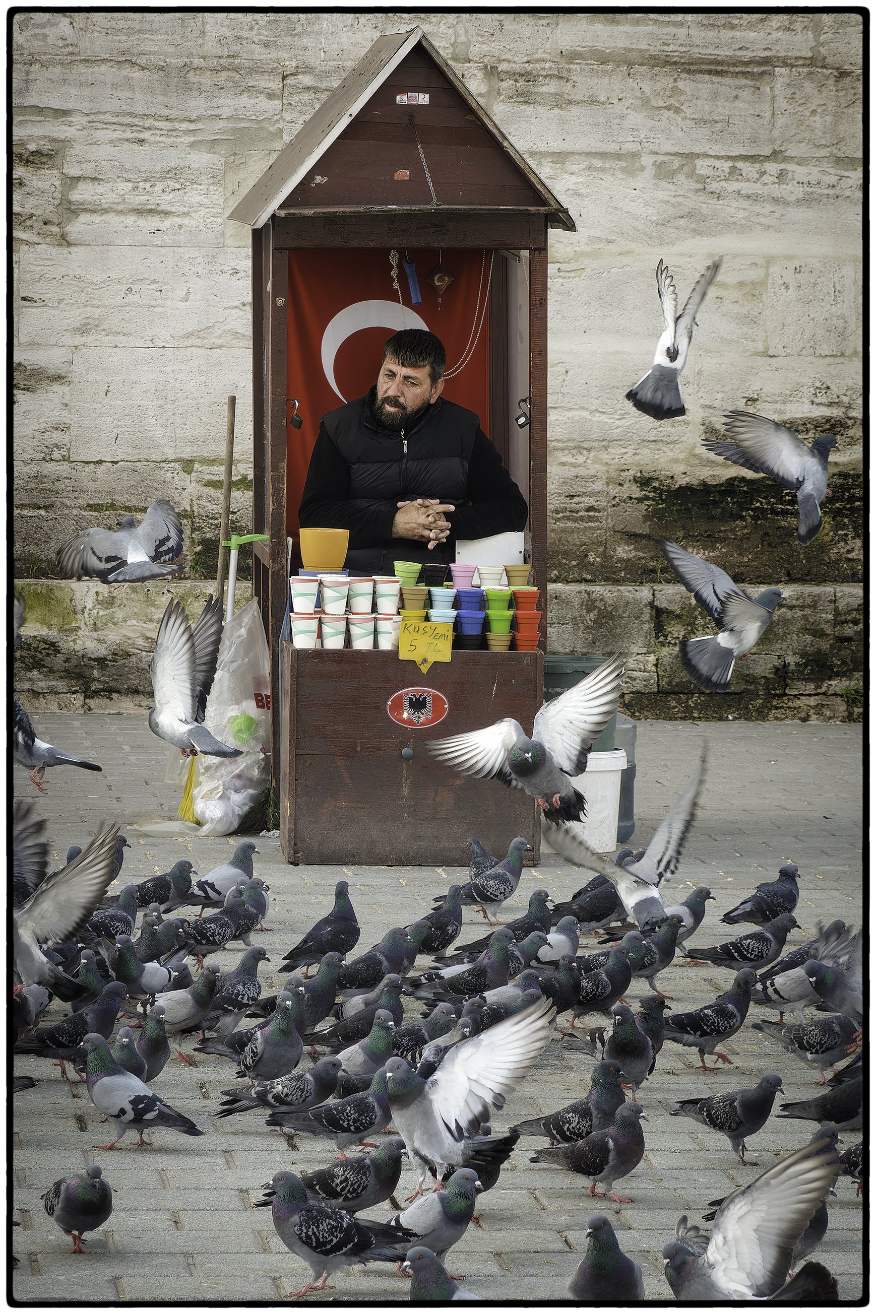$.25 (5 lira) to feed the pigeons.    