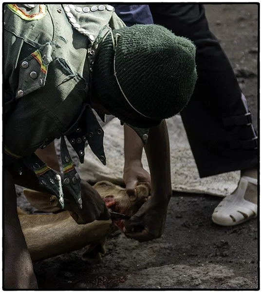 Slitting a goat's throat