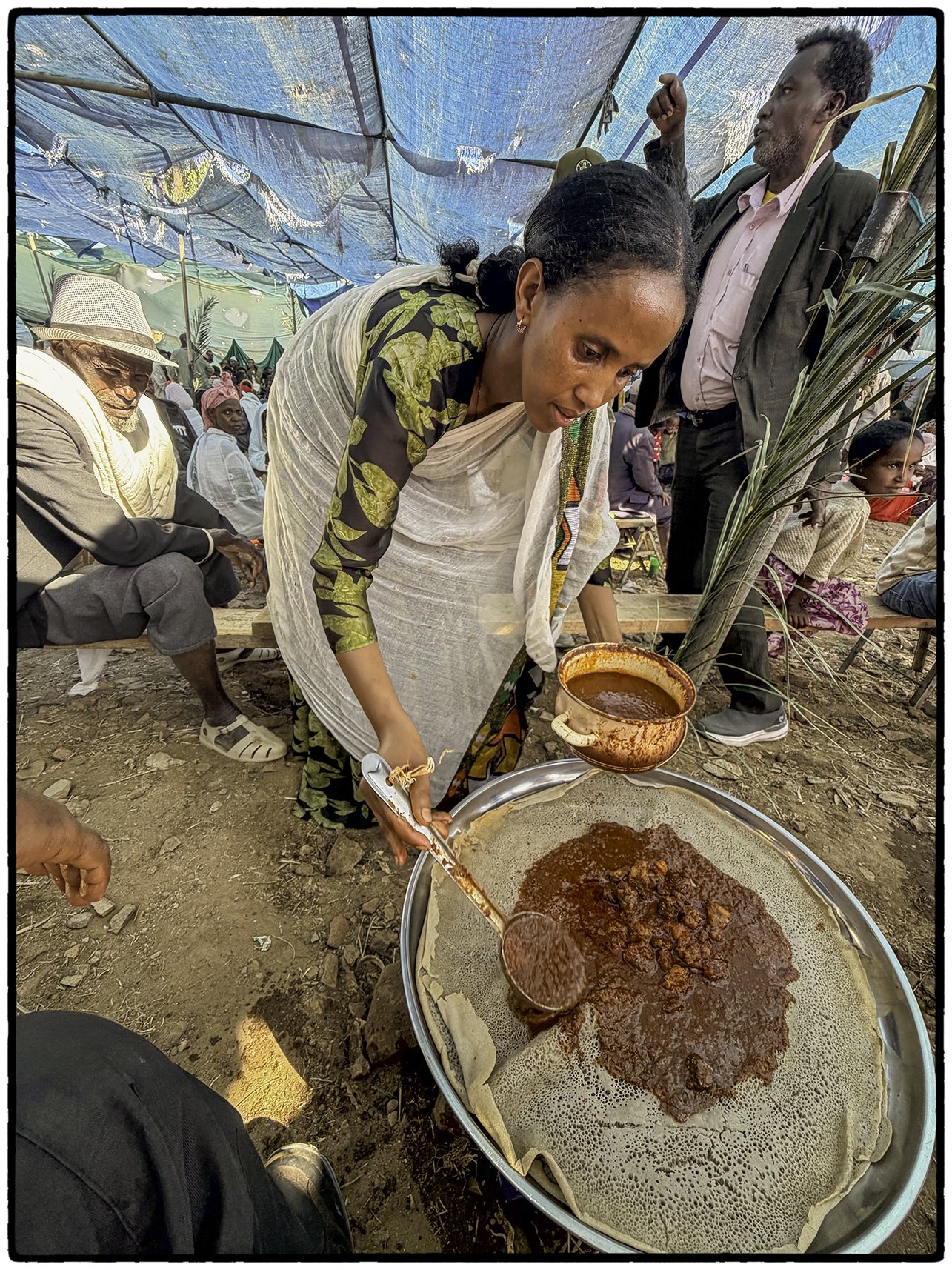 Serving injera at the wedding