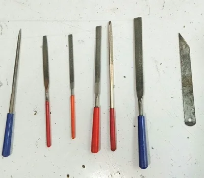 Some of the tools used in hand-filing the pins.