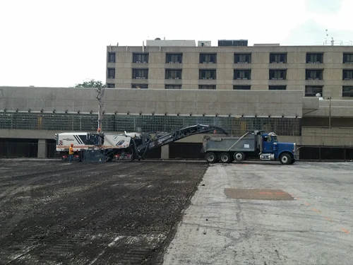 Pace Construction Co. milling machine at work on the playng surface. 