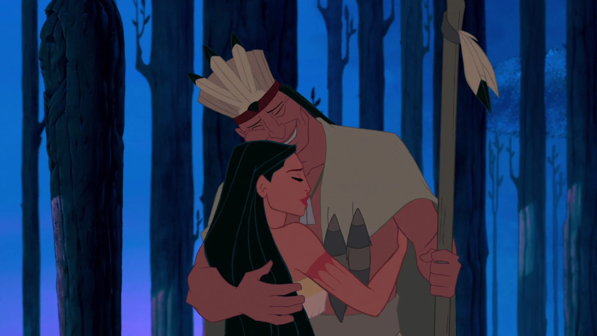 You can see Powhatan wears a feather headdress which represents his role as the chief/leader of his tribe. Pocahontas and her father Powhatan. Disney, 1995.