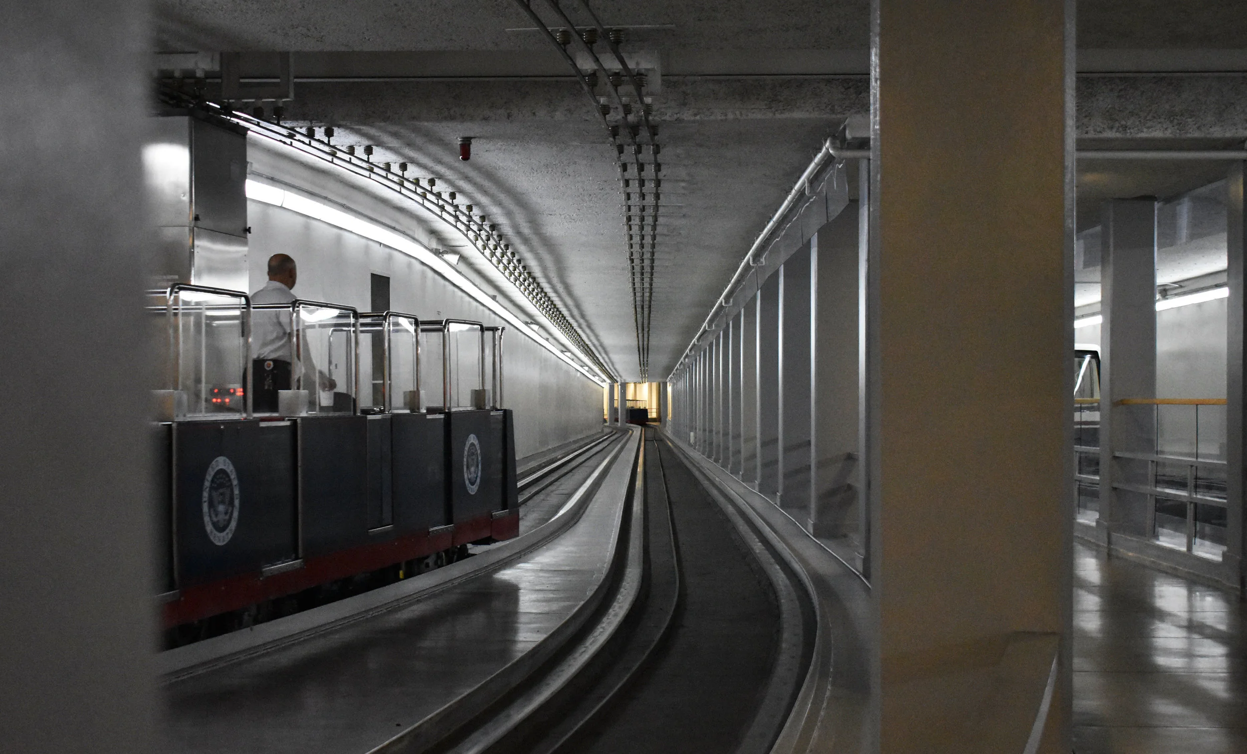 A man operates a train on the Senate subway system in the basement of the U.S. Capitol in Washington, Thursday, Jan. 25, 2018. (Lindsey Leake/American University)