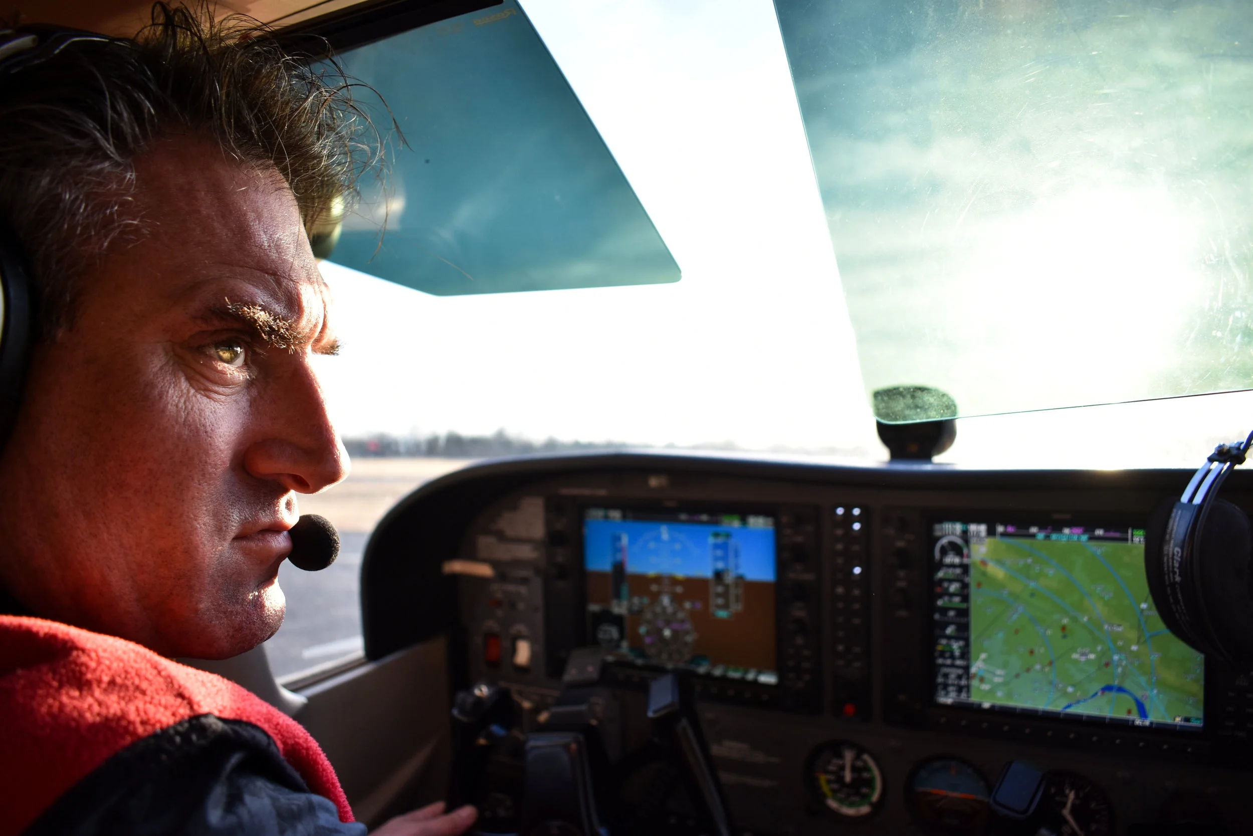 Raymond de Haan, assistant chief flight instructor at Aviation Adventures in Leesburg, Va., taxis a 2005 Cessna Skyhawk 172SP G1000 at Leesburg Executive Airport (JYO), Tuesday, Feb. 20, 2018. De Haan is an Amsterdam native whose call sign is "Dutchman." (Lindsey Leake/American University)