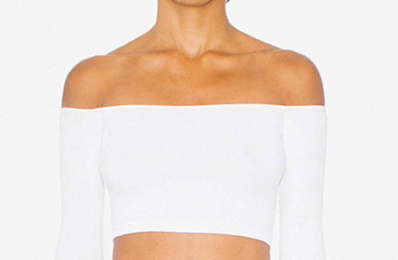 American Apparel Cotton Spandex Long Sleeve Off-Shoulder Top click here . Colour: White Wash: Coming soon... I'm super self-conscious of my upper arms. This shirt not only thins them out but it adds a nice lift to the cleavage!