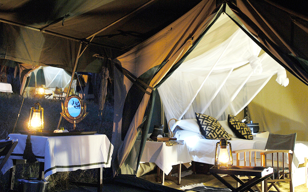 AK-Taylor-Safari-Travel-Kenya-Tented-Camp-Bedroom-luxury.gif