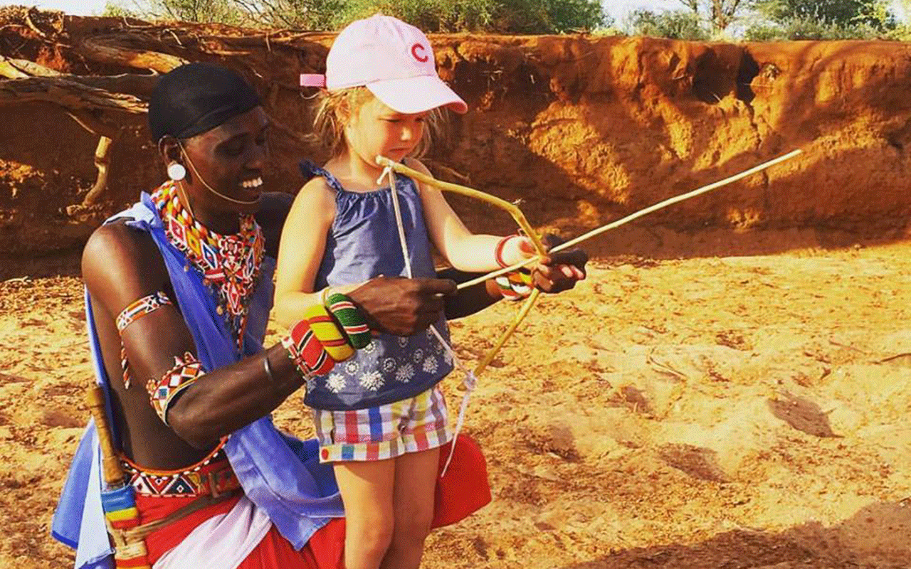 AK-Taylor-Safari-Travel-Kenya-Bow-Training-Maasai.gif