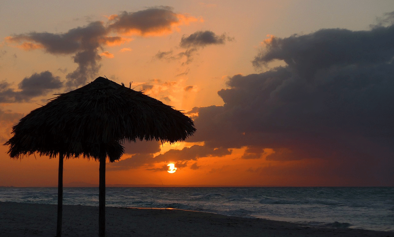 ak-taylor-travel-cuba-sunset-beach.gif