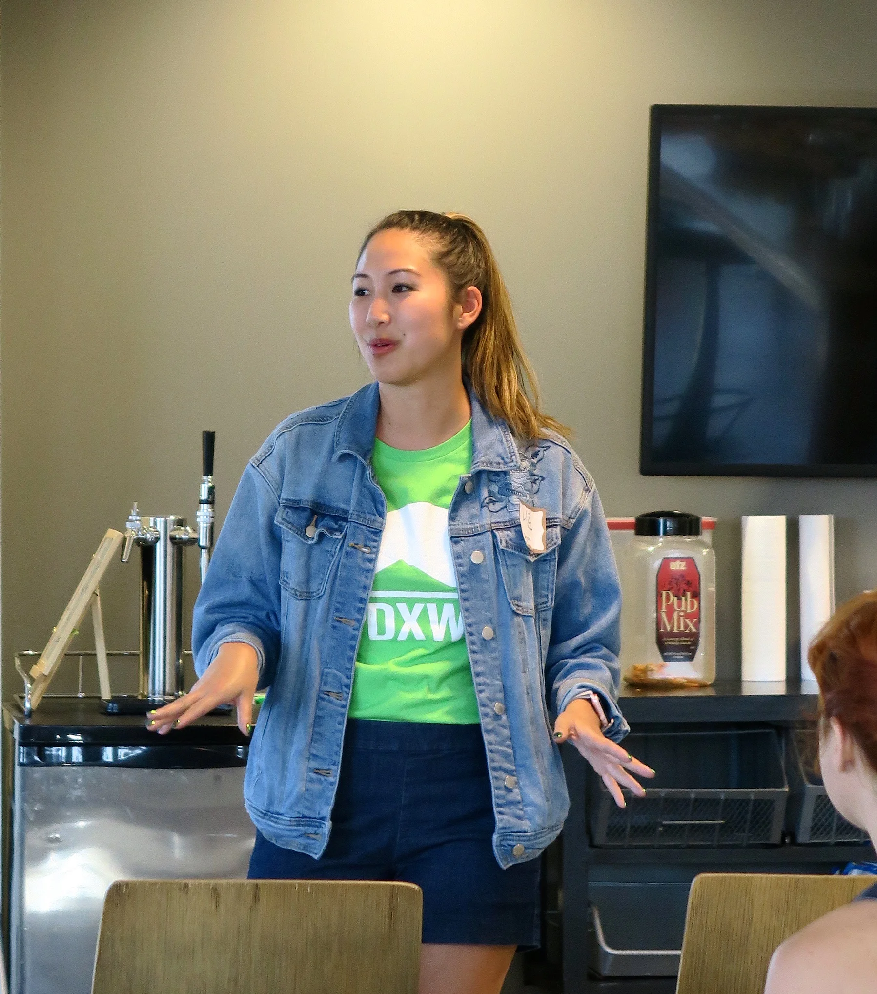 A PDXWIT volunteer presents