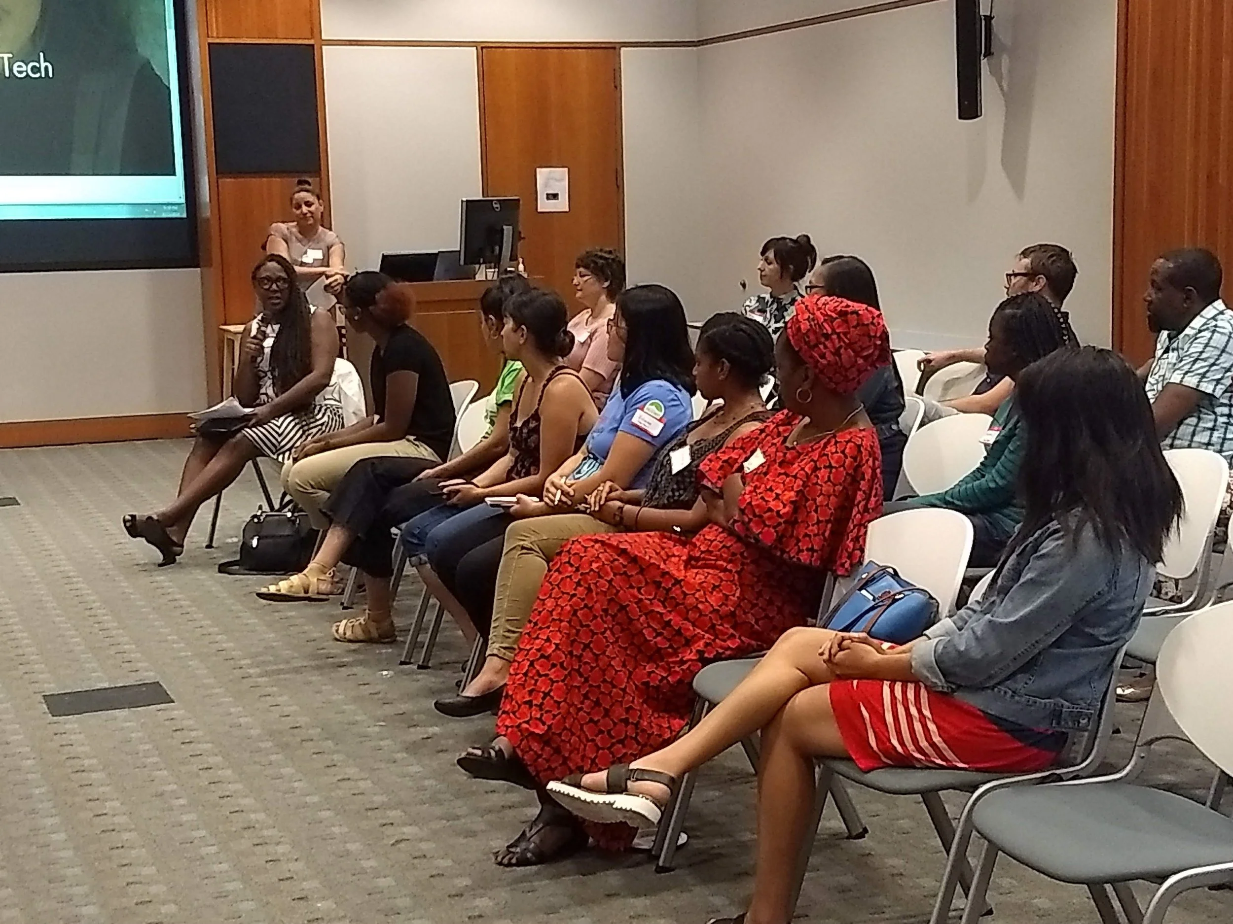 PDXWIT Women of Color in Tech @ NWEA, 8/15/18, Attendees listen during a group discussion