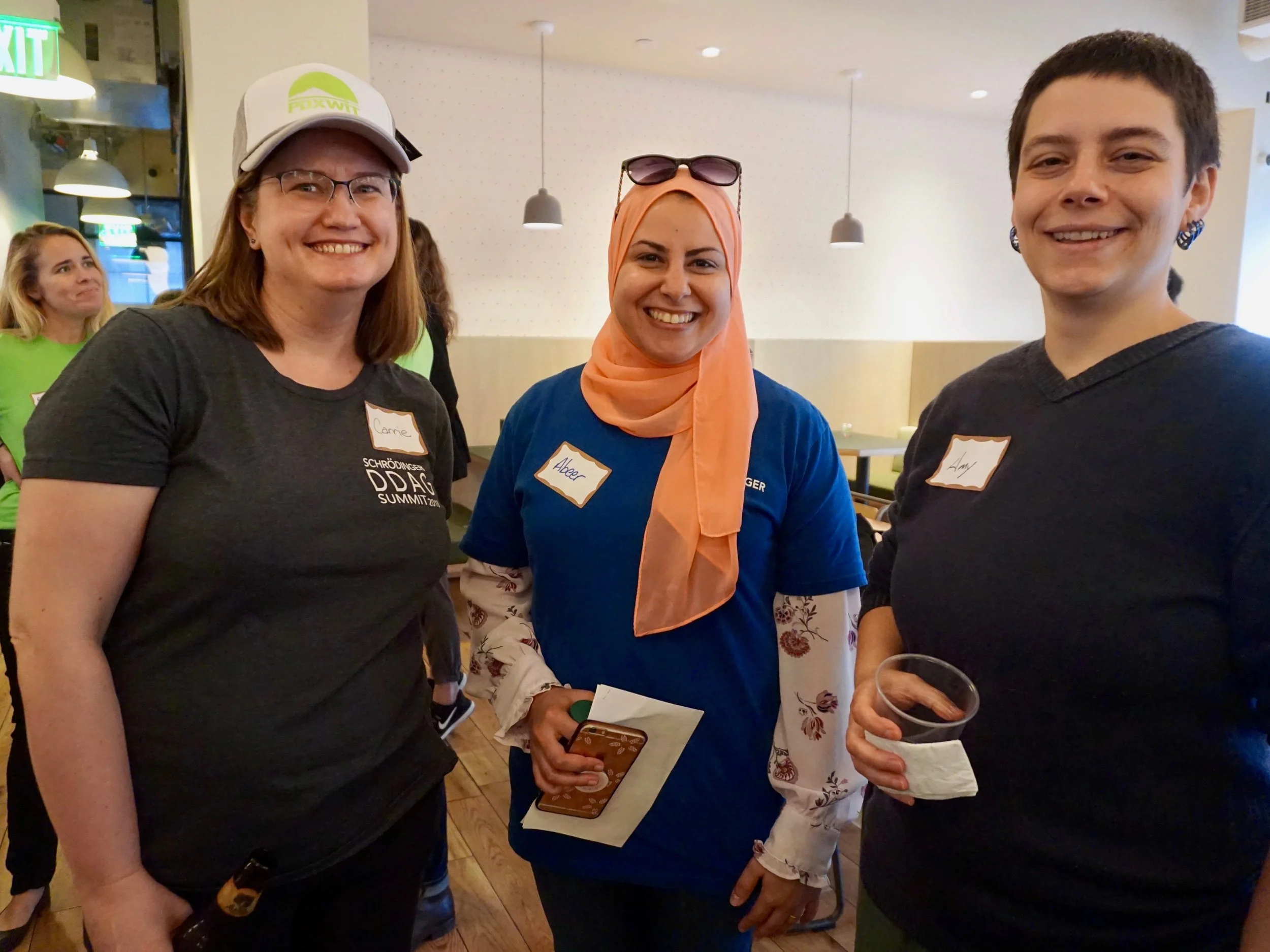 PDXWIT Happy Hour with Schrodinger @ WeWork Pioneer Place, 9/18/18, A few attendees pause for a photo.