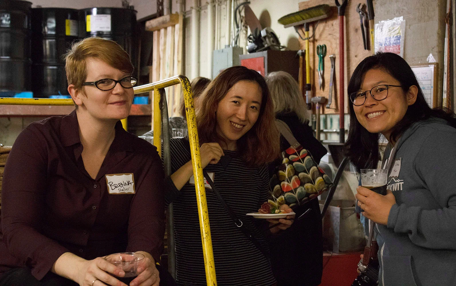 PDXWIT Happy Hour @ Free Geek, 11/27/18, A few attendees pause for a photo