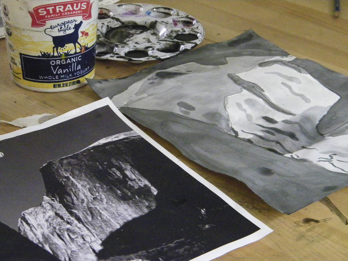 Students learn how value plays a role in atmospheric perspective with washes of India Ink.