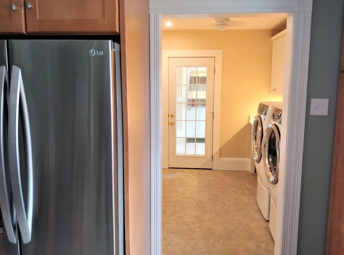 Laundry room entry with interior door in Hudson, MA home addition
