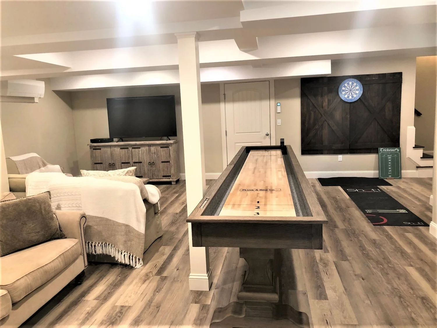 CUSTOM FINISHED BASEMENTS WITH ROOM TO PLAY.    