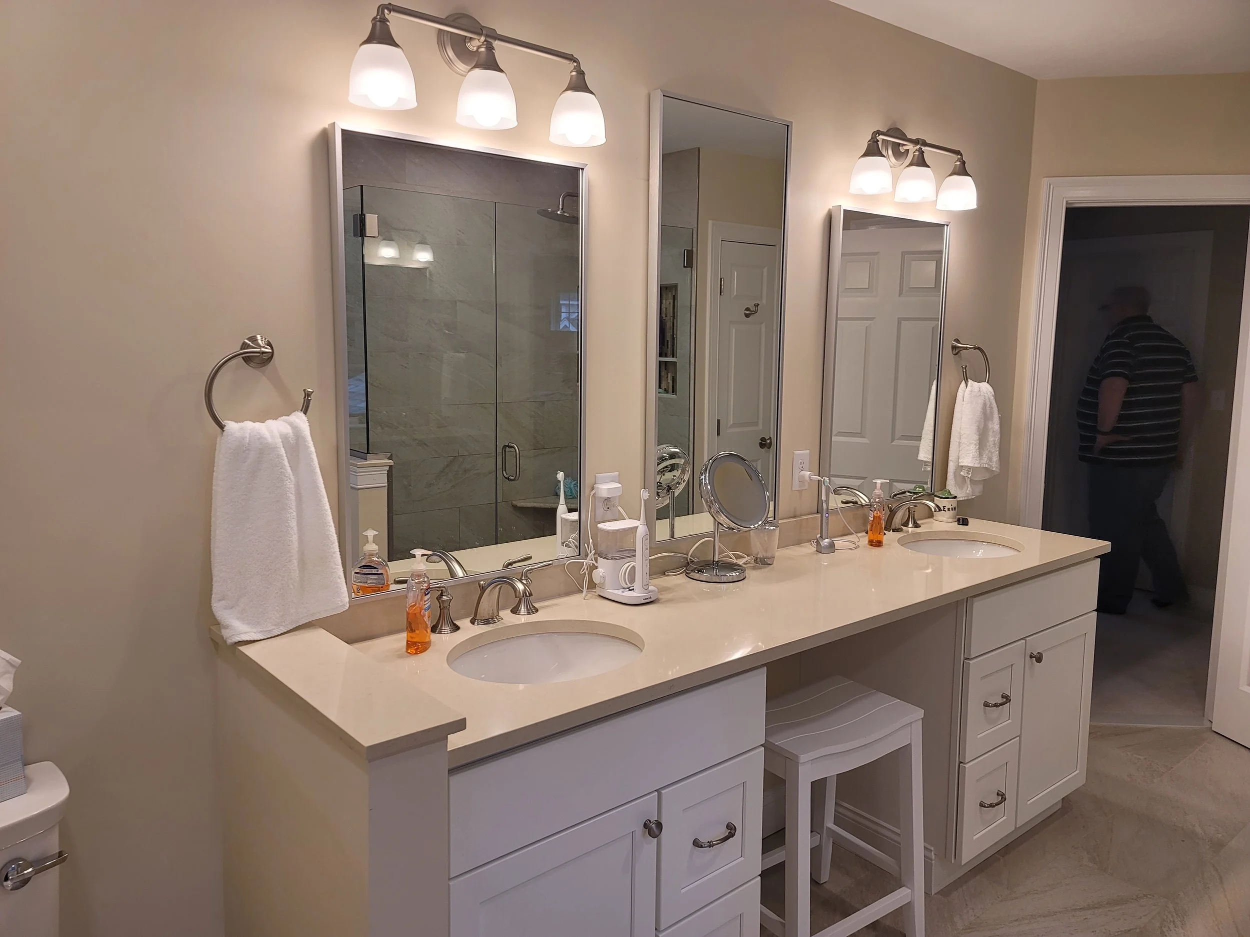 Primary bathroom double vanity in Stow MA with quartz countertops and Kohler fixtures