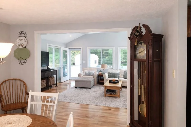 View into finished family room addition from adjacent dining area
