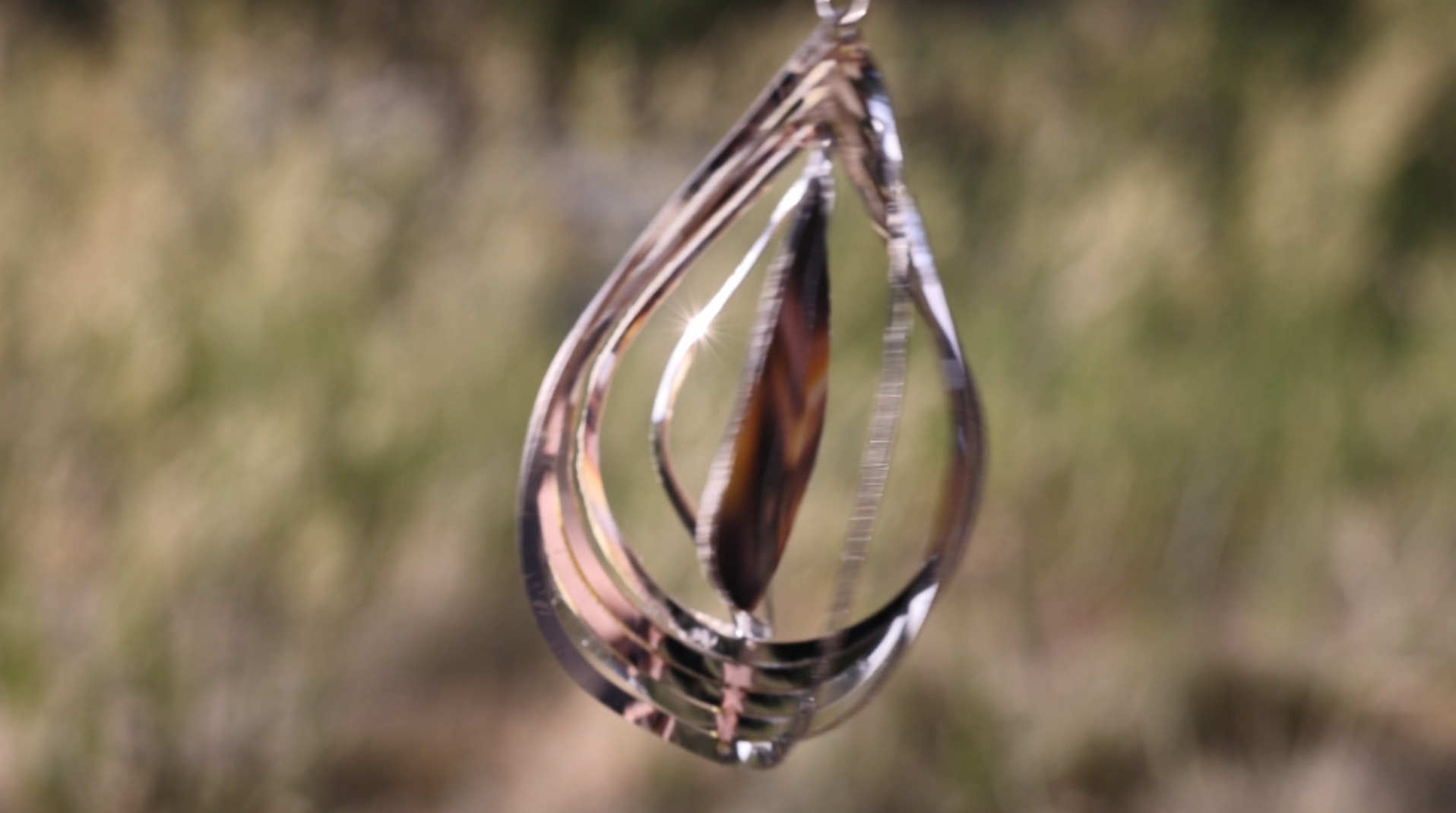"Water Series" (abstract image of sea anemone on metal wind mobile)