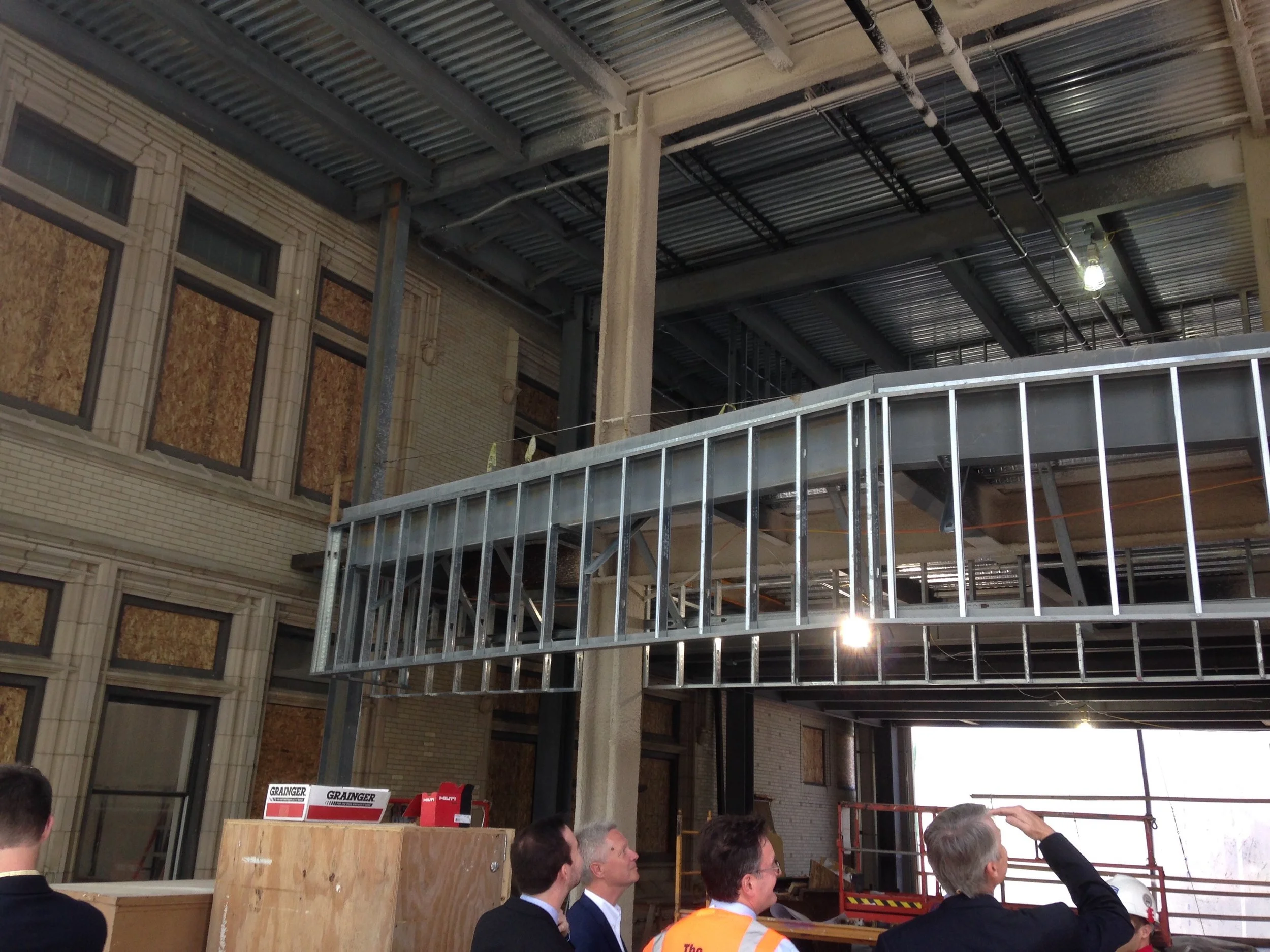 A picture of the new "cafe" on the middle floor with the balcony on the third floor above. Our new lab will be on the third floor right behind this balcony. 