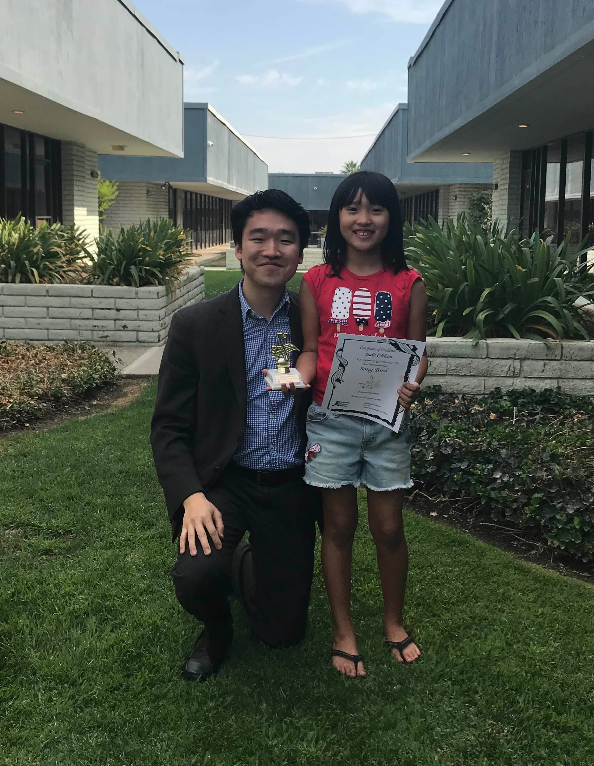 Jade takes violin lessons and recently received her Song Bird Trophy!