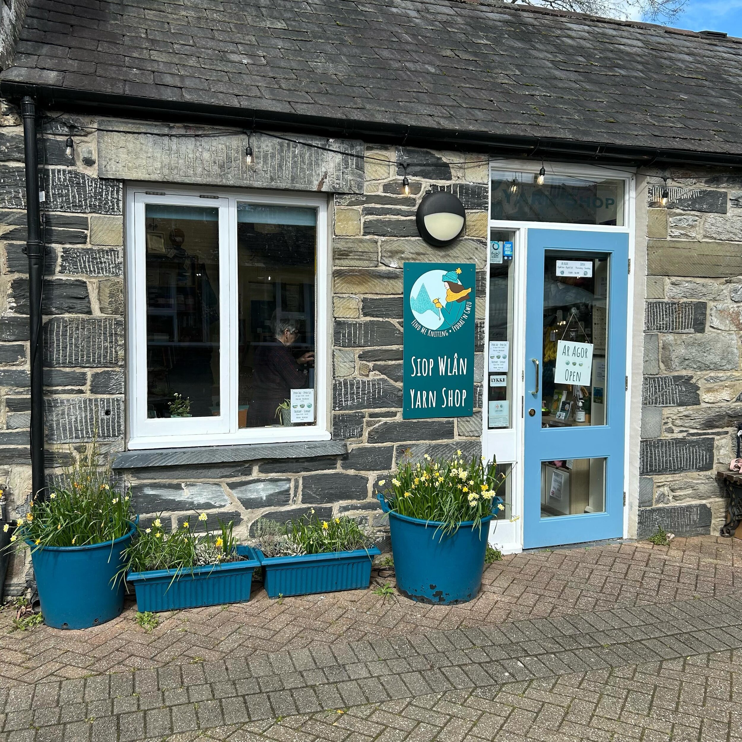 We&rsquo;re now open every week Thursday to Sunday, 11am until at least 4pm.

It&rsquo;s a glorious day here in Betws, so pop in and see Lindsay for your fill of woolly goodness! There&rsquo;s also some delicious fare next door at @findme_cooking and