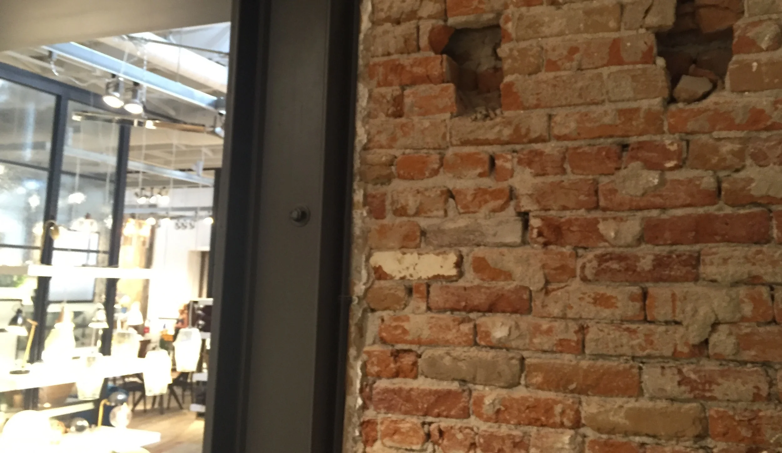 Requisite exposed, worn brick