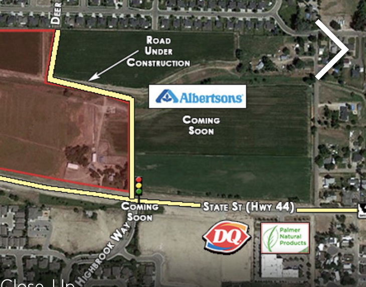 A real estate flyer for an adjacent parcel shows the new store site