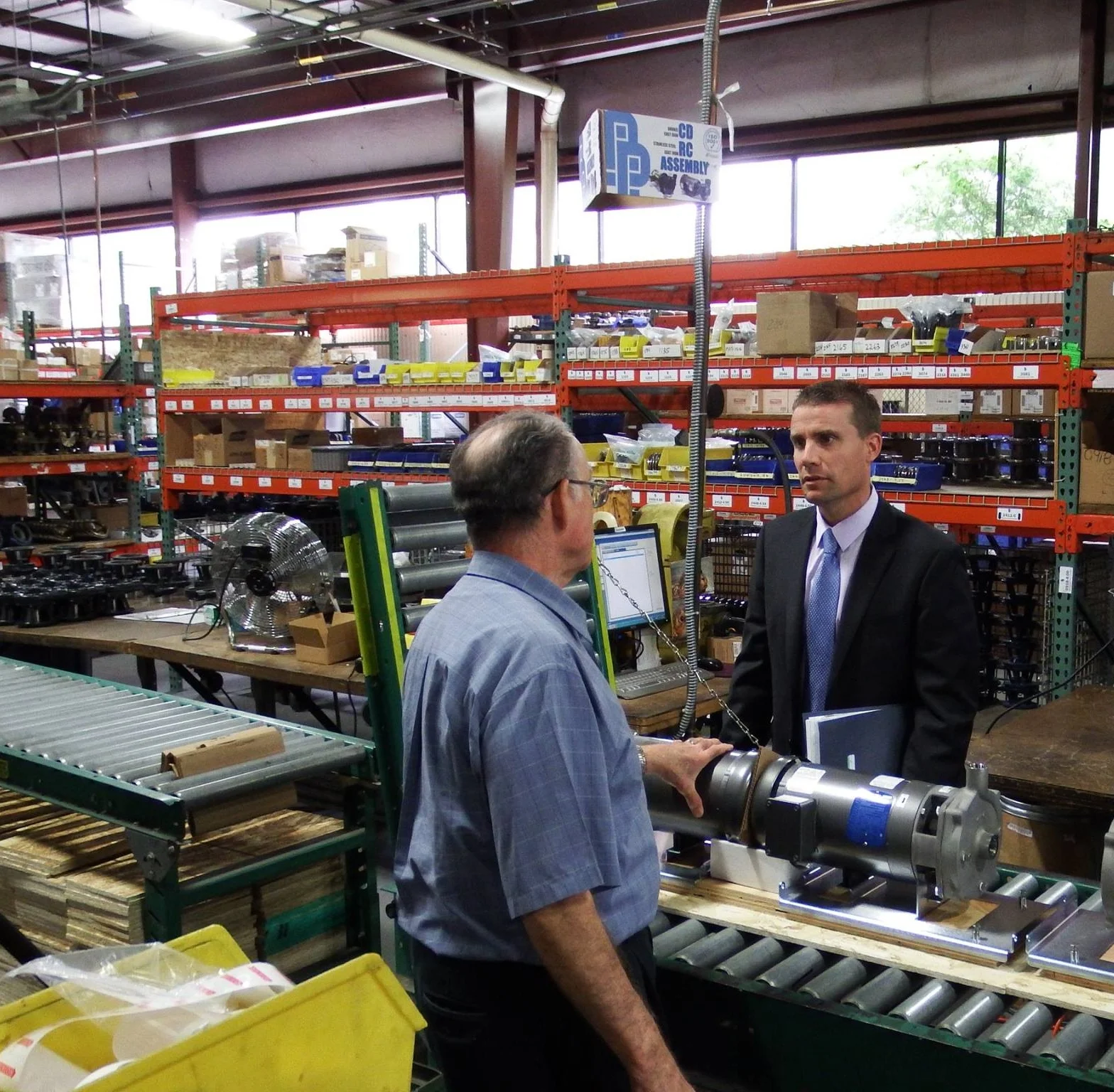 California State Senator Mike McGuire visits with Price Pump President Bob Piazza in Sonoma in 2016. Courtesy Price Pump 