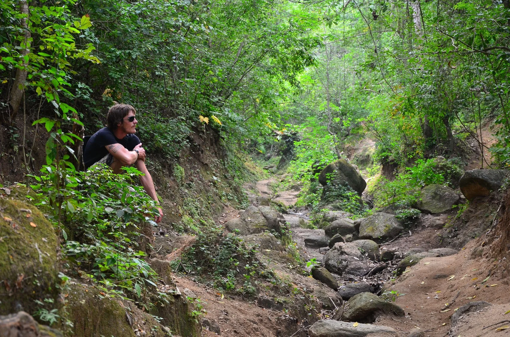 Guest enjoying nature and tropical plants on My Deztination botanical experience.