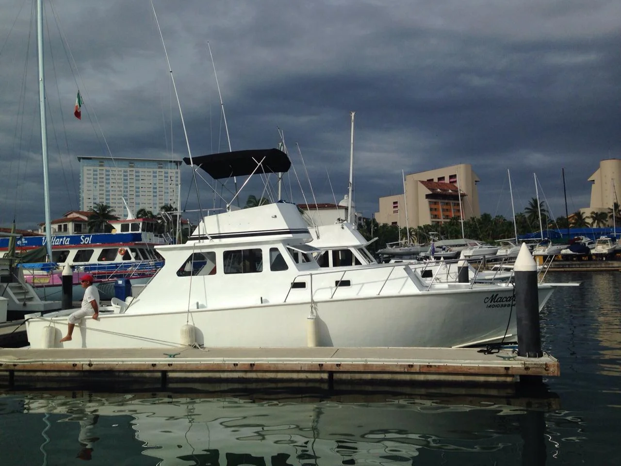 Luxury yacht docked at La Marina during My Deztination Puerto Vallarta tour.